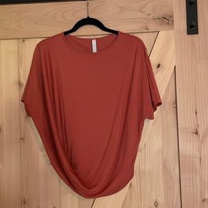 Athleta asymm burnt orange top